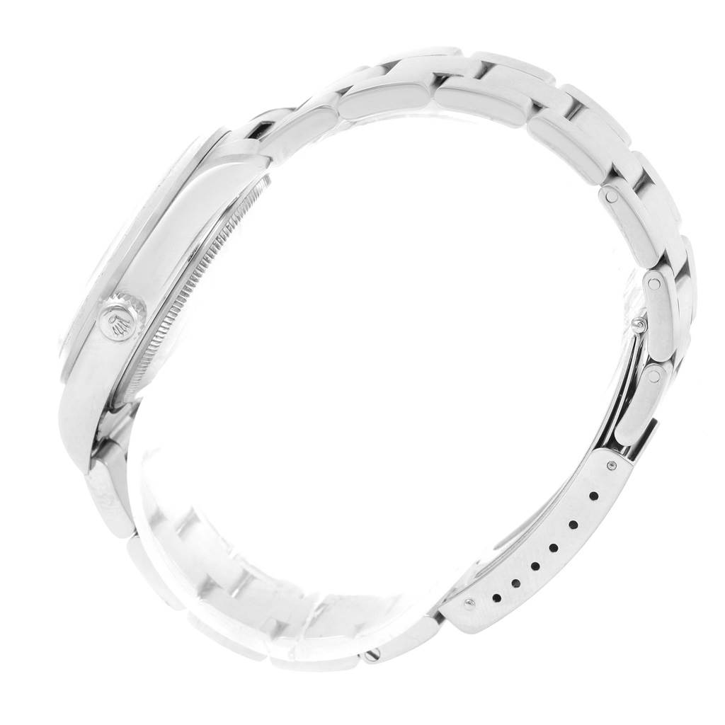 This image shows a side profile view of a Rolex Air-King 14000 Men's Stainless Steel White Dial 14000 Men's Stainless Steel White Dial watch, displaying its case, crown, and metal bracelet.