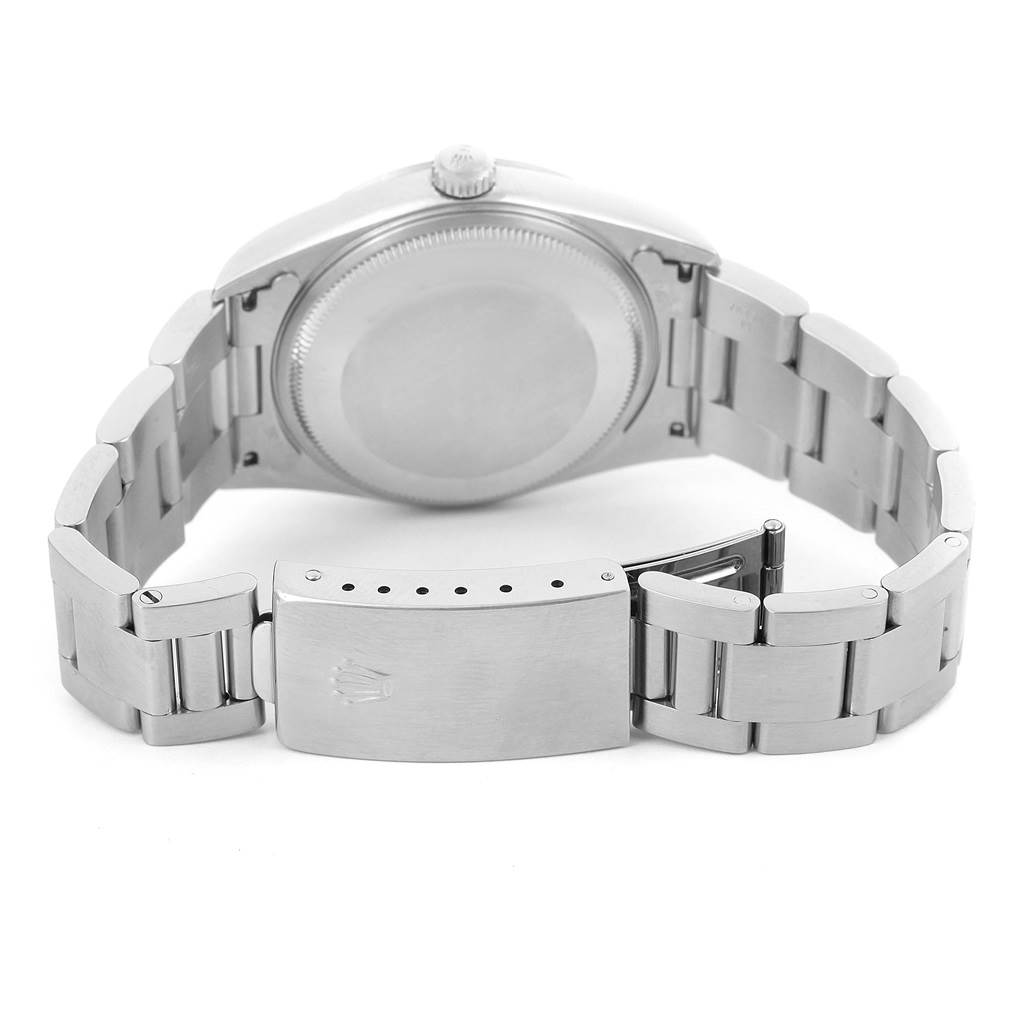 This image shows the back case and bracelet clasp of a Rolex Air-King 14000 Men's Stainless Steel White Dial 14000 Men's Stainless Steel White Dial watch from a rear angle.
