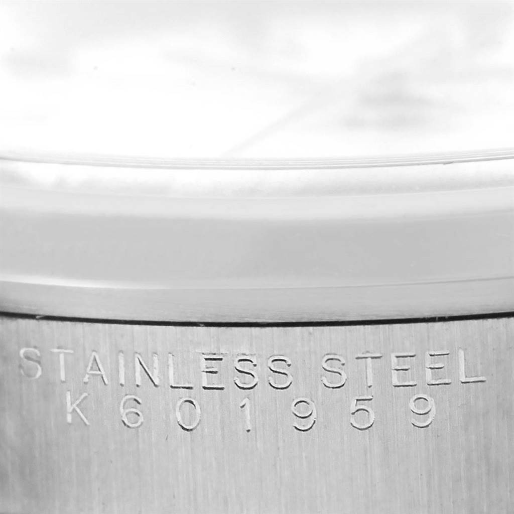 The image shows a close-up of the stainless steel case edge with the serial number of the Rolex Air-King 14000 Men's Stainless Steel White Dial 14000 Men's Stainless Steel White Dial watch.