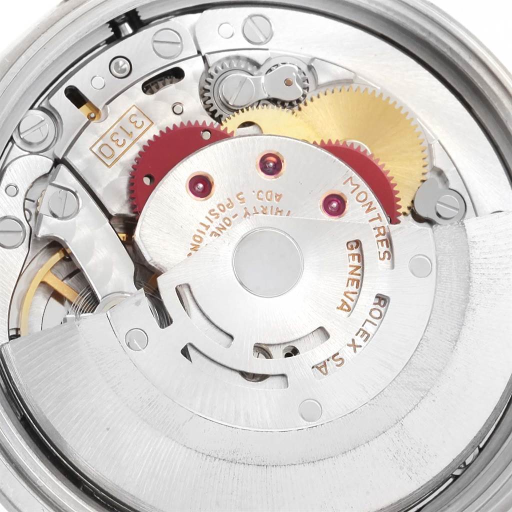 The image shows a close-up of the internal movement mechanism of a Rolex Air-King 14000 Men's Stainless Steel White Dial 14000 Men's Stainless Steel White Dial watch, highlighting gears and the rotor.