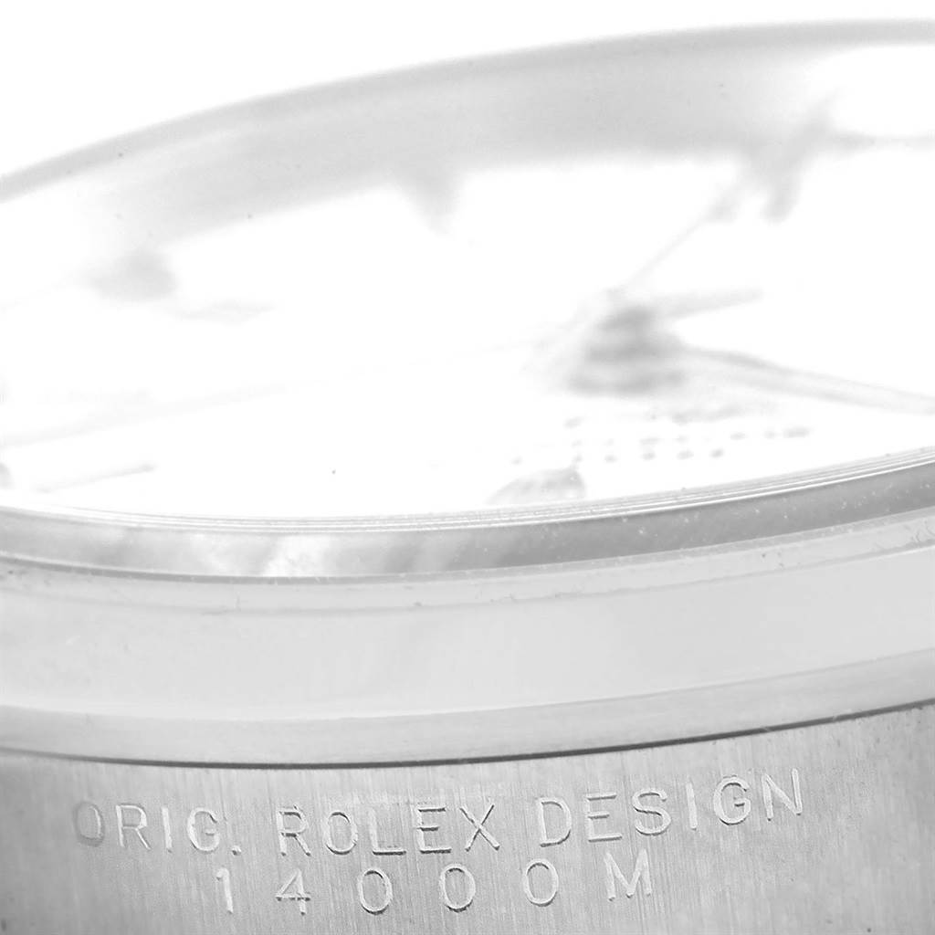 The image displays a close-up view of the case side of a Rolex Air-King 14000 Men's Stainless Steel White Dial 14000 Men's Stainless Steel White Dial watch, showing engraved text "ORIG. ROLEX DESIGN 14000M."
