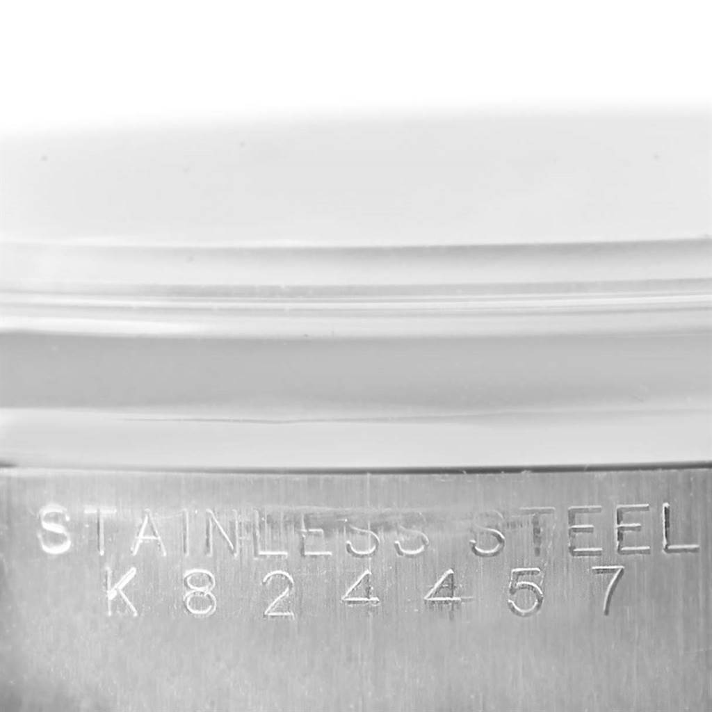 Close-up of the caseback showing the “STAINLESS STEEL” engraving and serial number of the Rolex Air-King 14000 Men's Stainless Steel Blue Dial 14000 Men's Stainless Steel Blue Dial watch.