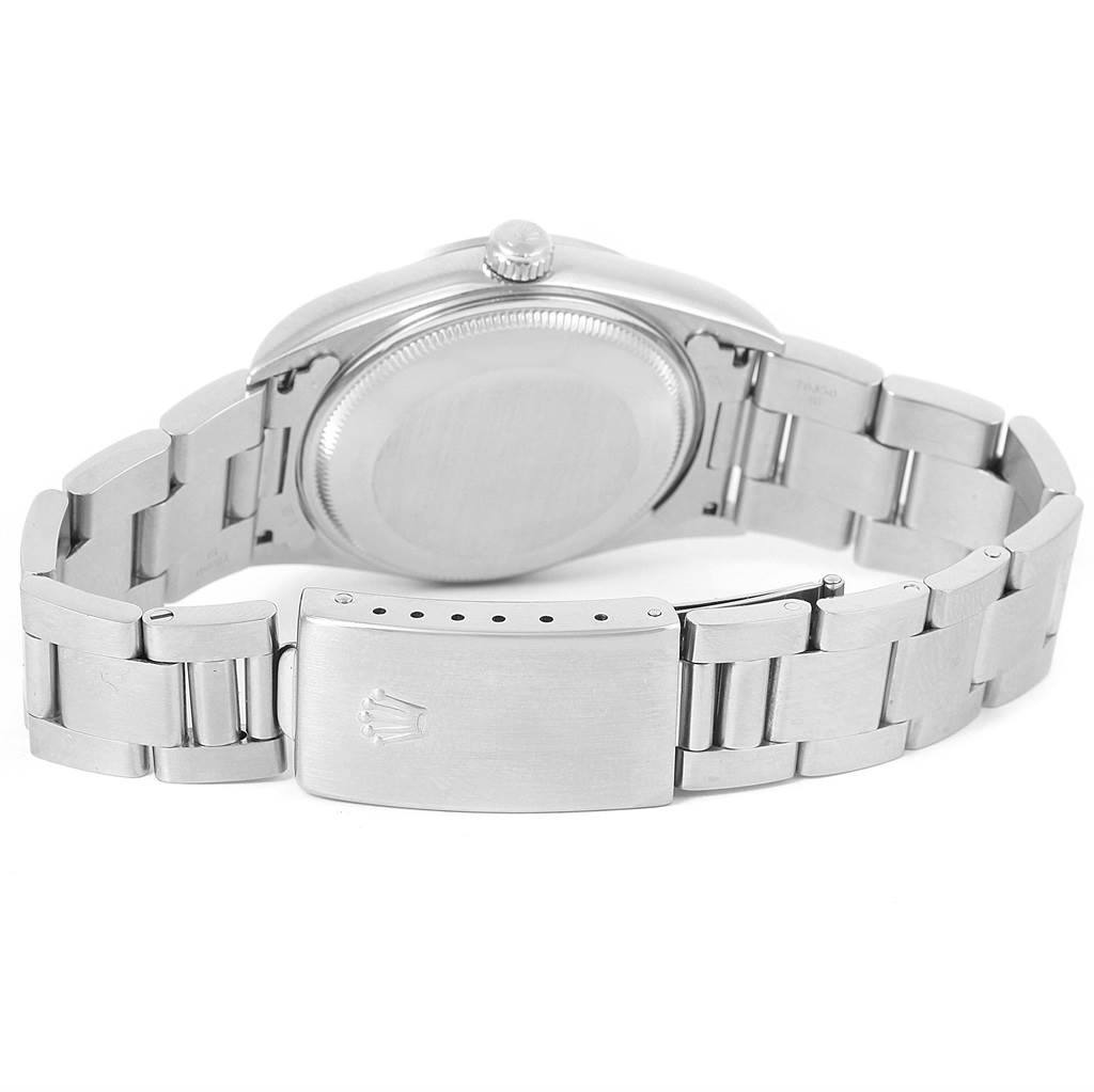 The image shows the back view of a Rolex Air-King 14000 Men's Stainless Steel Black Dial 14000 Men's Stainless Steel Black Dial watch, focusing on the caseback and the metal bracelet clasp.