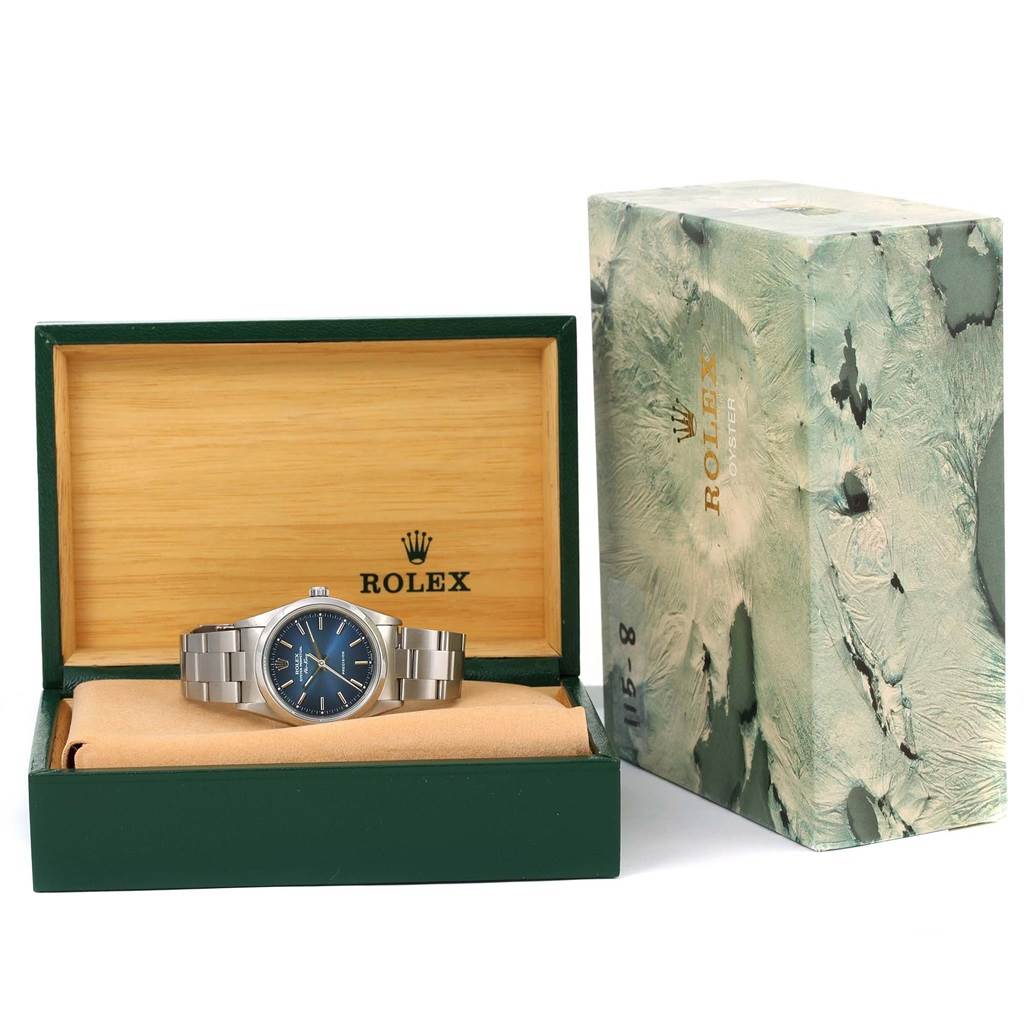 The image shows a Rolex Air-King 14000 Men's Stainless Steel Blue Dial 14000 Men's Stainless Steel Blue Dial watch from a front angle, displayed in an open Rolex box with its exterior packaging beside it.