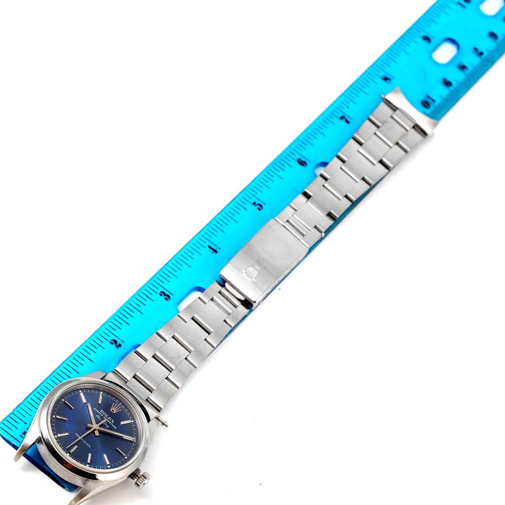 The image shows a Rolex Air-King 14000 Men's Stainless Steel Blue Dial 14000 Men's Stainless Steel Blue Dial watch laid flat next to a ruler, displaying the face, bracelet, and clasp.