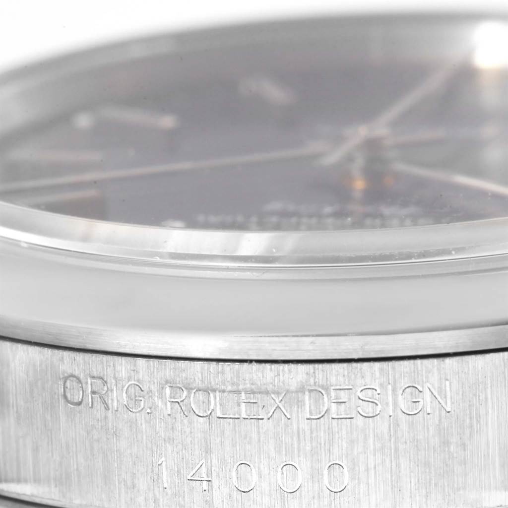 The image shows a close-up side angle of the Rolex Air-King 14000 Men's Stainless Steel Blue Dial 14000 Men's Stainless Steel Blue Dial watch, highlighting the edge of the crystal and engraved bezel.