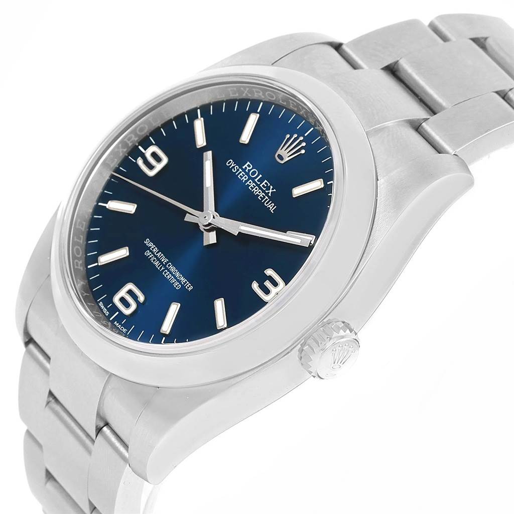 The Rolex Air-King 116000 Men's Stainless Steel Blue Dial 116000 Men's Stainless Steel Blue Dial watch is shown at a three-quarter angle, highlighting its blue dial, crown, and bracelet.