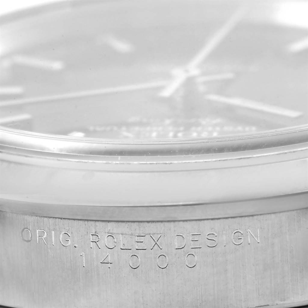 The image shows a close-up side view of the Rolex Air-King 14000 Men's Stainless Steel Black Dial 14000 Men's Stainless Steel Black Dial watch, highlighting its glass, bezel, and engraved model number on its case.