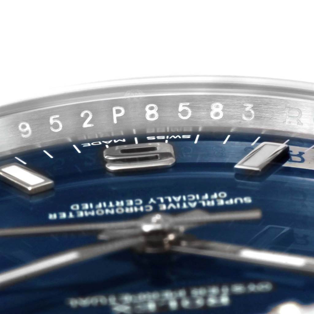 This image shows a close-up of the dial and part of the bezel of a Rolex Air-King 114200BLASO Men's Stainless Steel Blue Dial 114200BLASO Men's Stainless Steel Blue Dial watch.