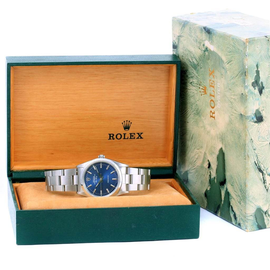 The image shows a Rolex Air-King 14000 Men's Stainless Steel Black Dial 14000 Men's Stainless Steel Black Dial watch angled from the front, displayed in its opened green and wooden box, with the outer box beside it.