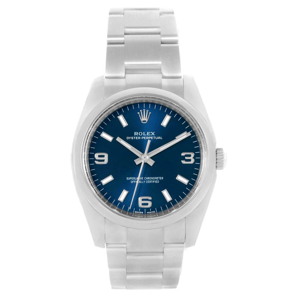The Rolex Air-King 114200 Men's Stainless Steel Blue Dial 114200 Men's Stainless Steel Blue Dial watch is shown from a front angle, displaying the dial, hands, and bracelet.