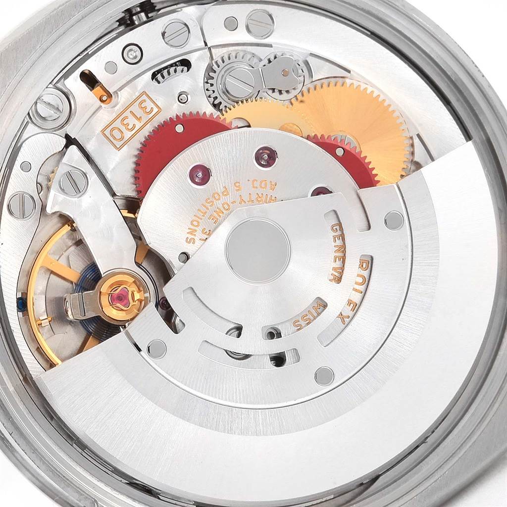 This image shows a close-up view of the movement inside a Rolex Air-King 114200 Men's Stainless Steel Blue Dial 114200 Men's Stainless Steel Blue Dial watch.