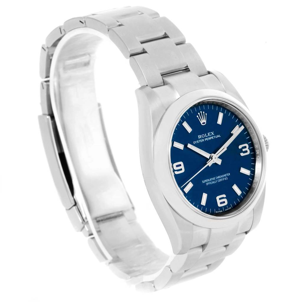 The image shows a Rolex Air-King 114200 Men's Stainless Steel Blue Dial 114200 Men's Stainless Steel Blue Dial watch at a three-quarter angle, highlighting the bracelet, case, and blue dial.