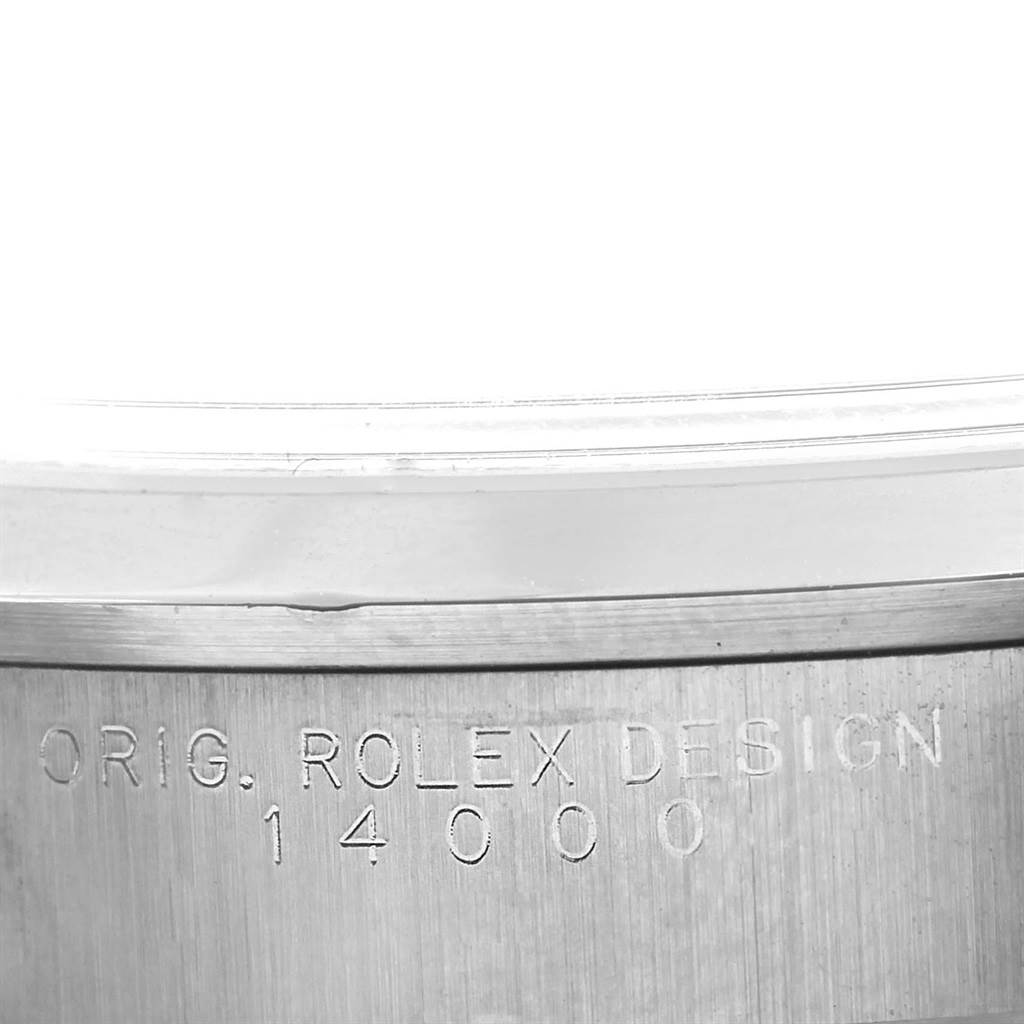 The image shows a close-up angle of the case of a Rolex Air-King 14000 Men's Stainless Steel Blue Dial 14000 Men's Stainless Steel Blue Dial watch, featuring the engraved model number "14000."