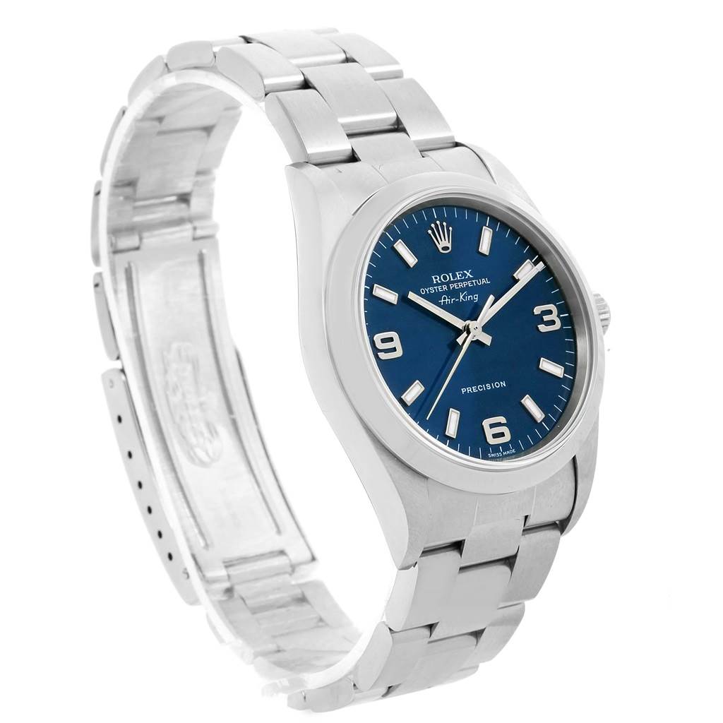 The image shows a side angle of a Rolex Air-King 14000 Men's Stainless Steel Blue Dial 14000 Men's Stainless Steel Blue Dial watch, highlighting its blue dial and metal bracelet.