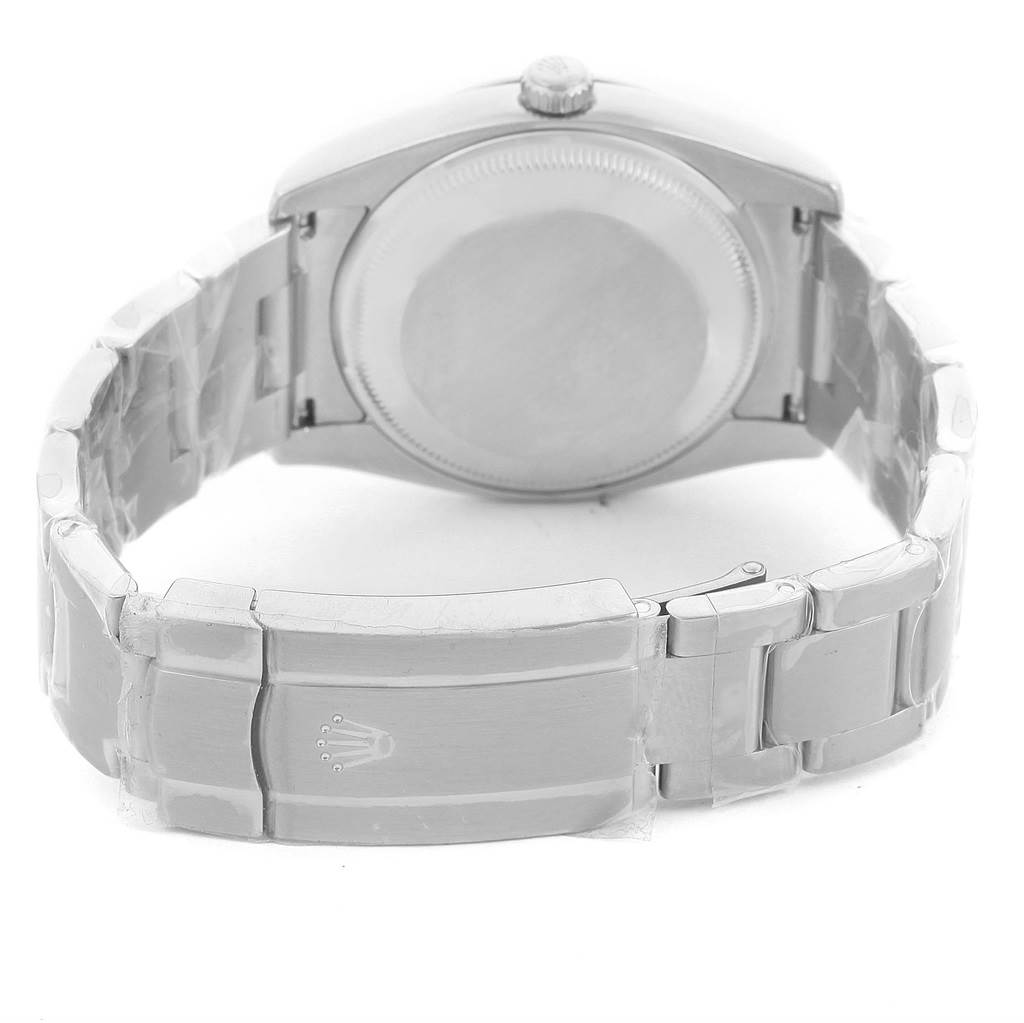 The image shows the back of the Rolex Air-King 114200BLASO Men's Stainless Steel Blue Dial 114200BLASO Men's Stainless Steel Blue Dial watch, including its case back and bracelet with the clasp.