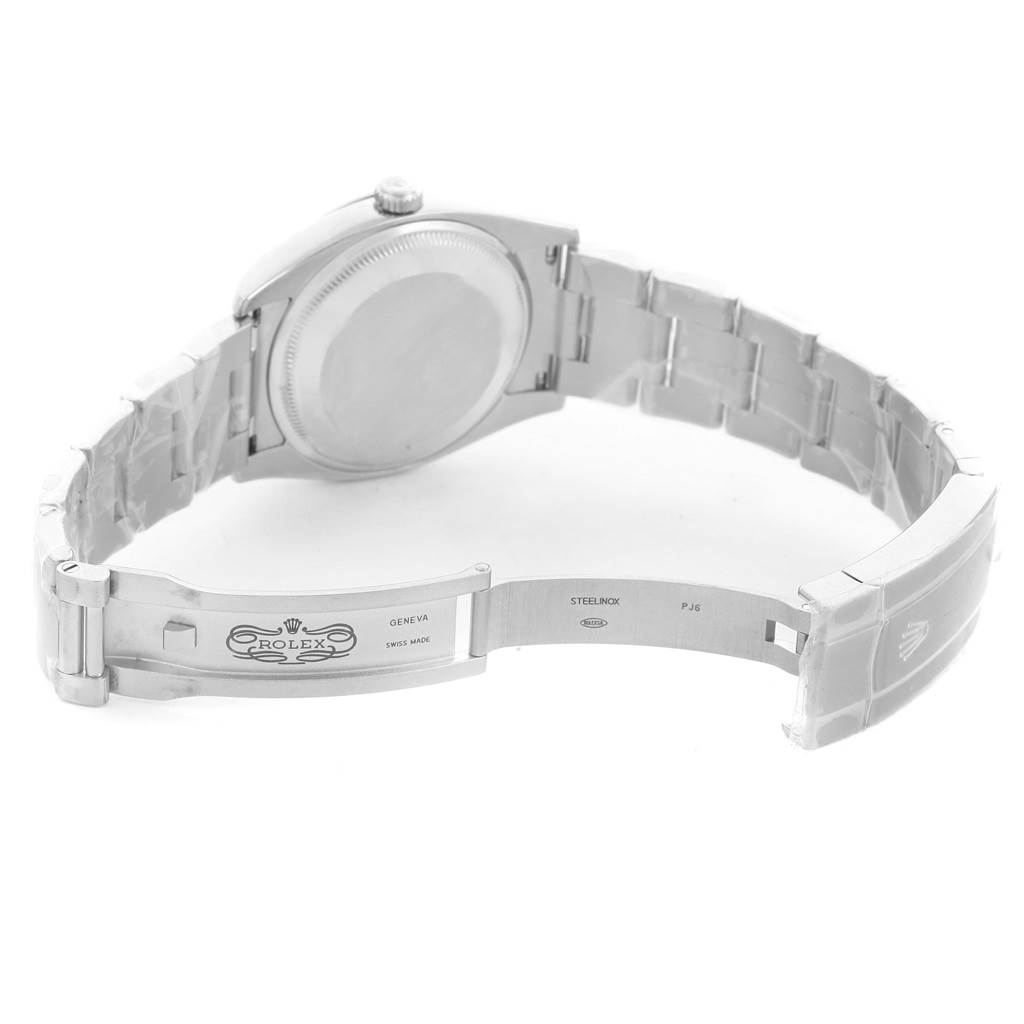 The image shows the open clasp and underside of the Rolex Air-King 114200BLASO Men's Stainless Steel Blue Dial 114200BLASO Men's Stainless Steel Blue Dial model, highlighting the bracelet and engraved branding.