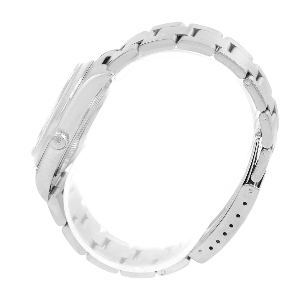 The Rolex Air-King 14000 Men's Stainless Steel Blue Dial 14000 Men's Stainless Steel Blue Dial watch is shown from a side view, highlighting its case, crown, and bracelet.