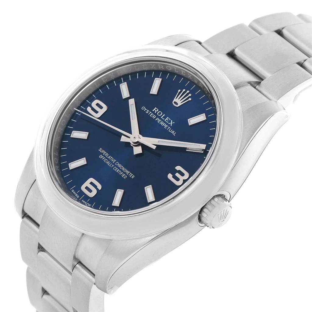 The image shows a Rolex Air-King 114200BLASO Men's Stainless Steel Blue Dial 114200BLASO Men's Stainless Steel Blue Dial watch at an angled top view, highlighting the face, bezel, crown, and part of the bracelet.