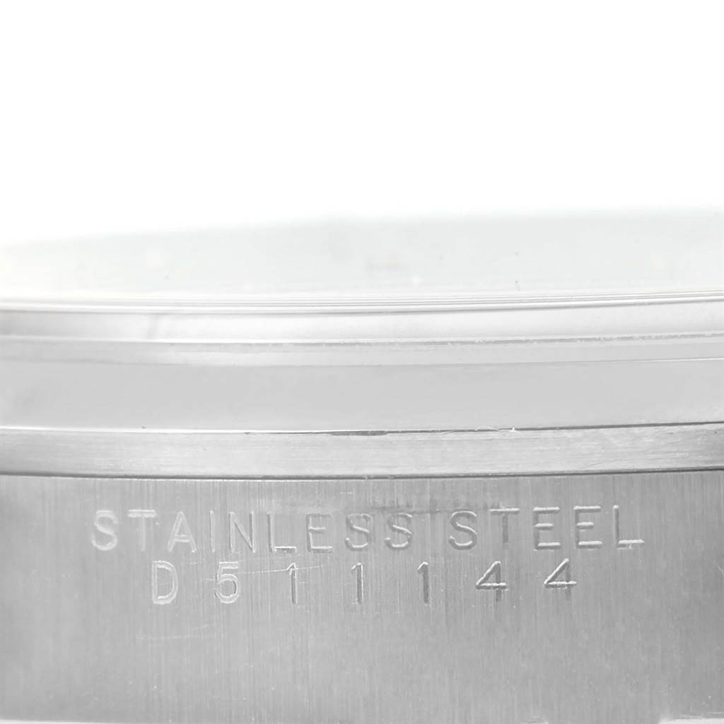 This close-up image shows the side engraving on the stainless steel case of the Rolex Air-King 14000 Men's Stainless Steel Pink Dial 14000 Men's Stainless Steel Pink Dial watch.