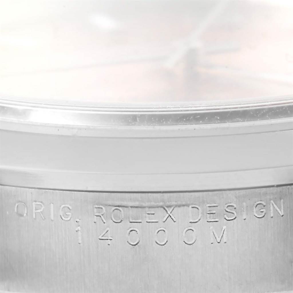 This image shows a close-up of the side case and serial engraving "14000M" on a Rolex Air-King 14000 Men's Stainless Steel Pink Dial 14000 Men's Stainless Steel Pink Dial watch.