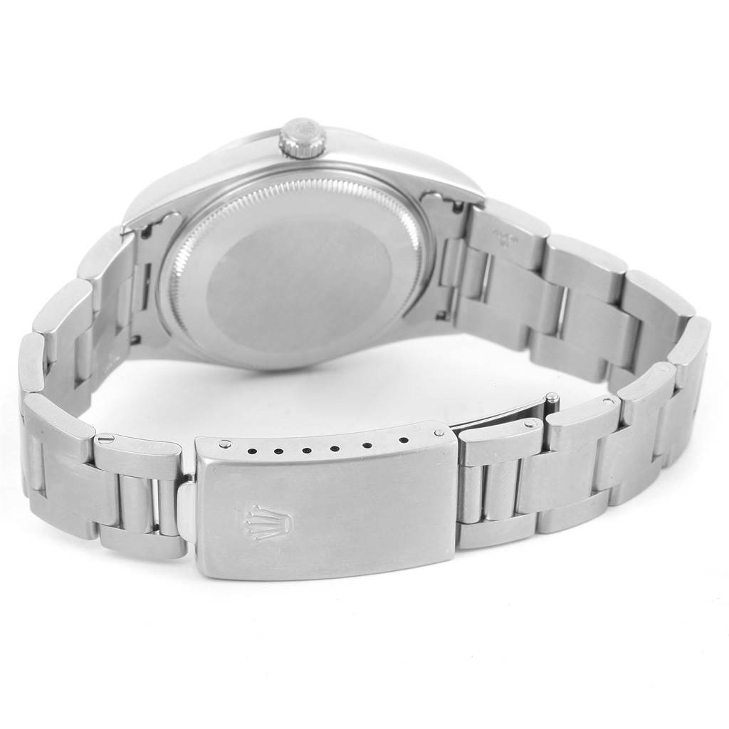 This image shows the back side and clasp of the Rolex Air-King 14000 Men's Stainless Steel Pink Dial 14000 Men's Stainless Steel Pink Dial watch, focused on the bracelet and case back.