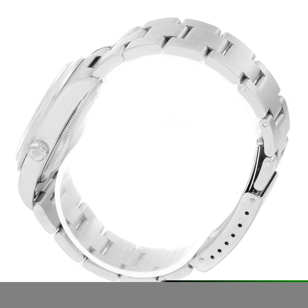 This image shows a side view of the Rolex Air-King 14000 Men's Stainless Steel Pink Dial 14000 Men's Stainless Steel Pink Dial watch, including the crown and bracelet.