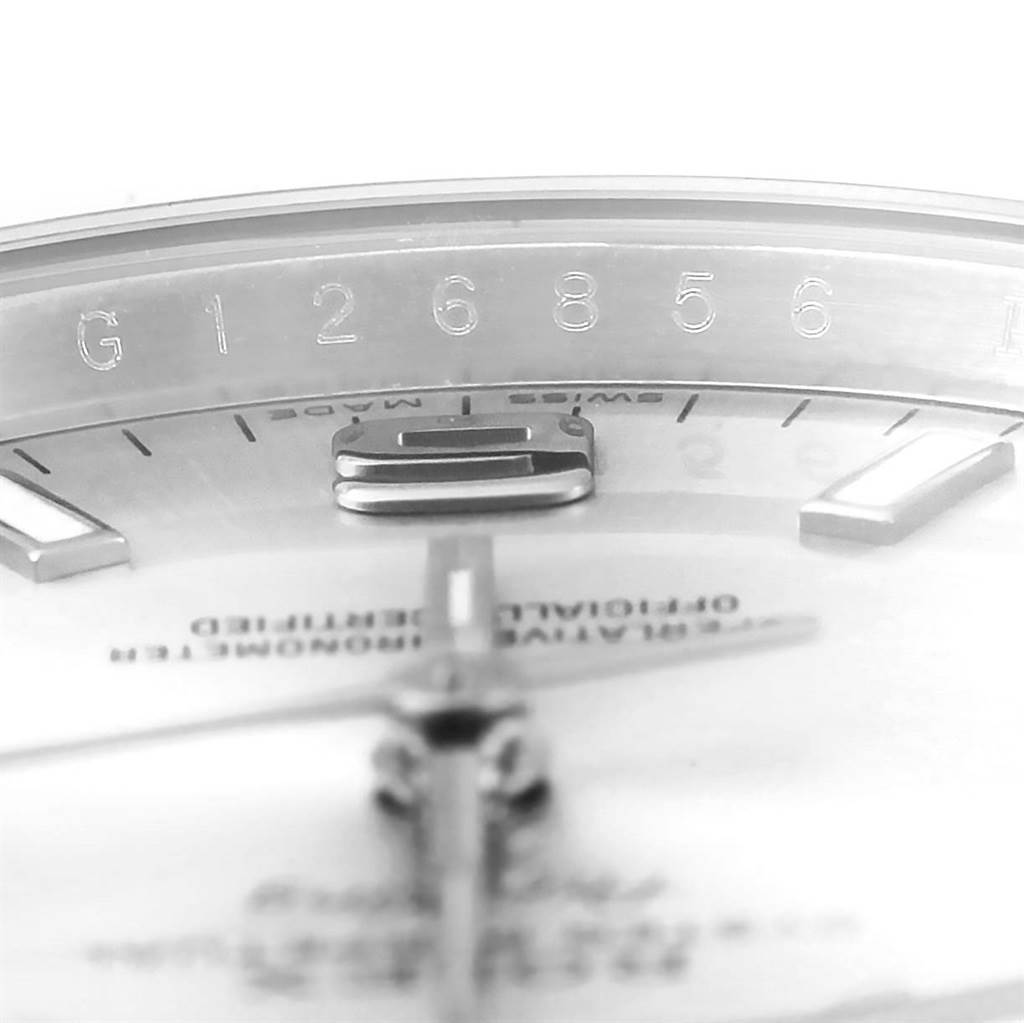 This image shows a close-up view of a Rolex Air-King 114200 Men's Stainless Steel Silver Dial 114200 Men's Stainless Steel Silver Dial watch, focusing on the serial number and part of the dial.