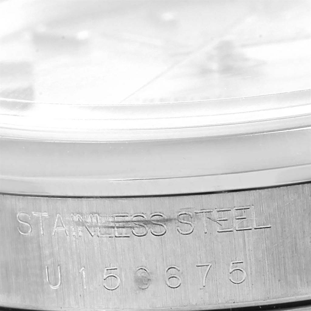 This close-up angle shows the side of the Rolex Air-King 14000 Men's Stainless Steel Silver Dial 14000 Men's Stainless Steel Silver Dial watch, highlighting the stainless steel casing and serial number engraving.
