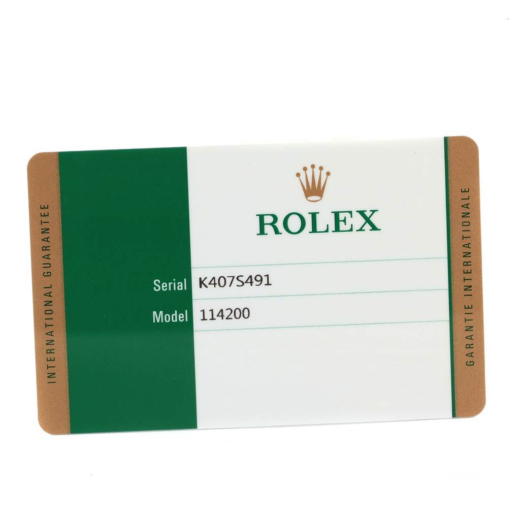 This is a warranty card for a Rolex Air-King 114200 Men's Stainless Steel Blue Dial 114200 Men's Stainless Steel Blue Dial model 114200, showing the serial number K407S491 and brand logo.