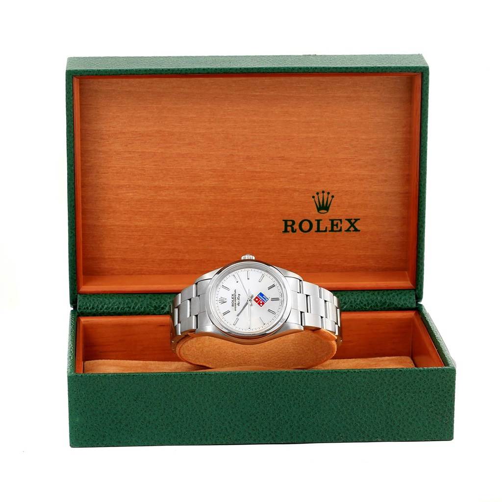 The image shows a Rolex Air-King 14000 Men's Stainless Steel Silver Dial 14000 Men's Stainless Steel Silver Dial watch placed inside an open green and wooden Rolex box, presenting the watch face and metal bracelet.