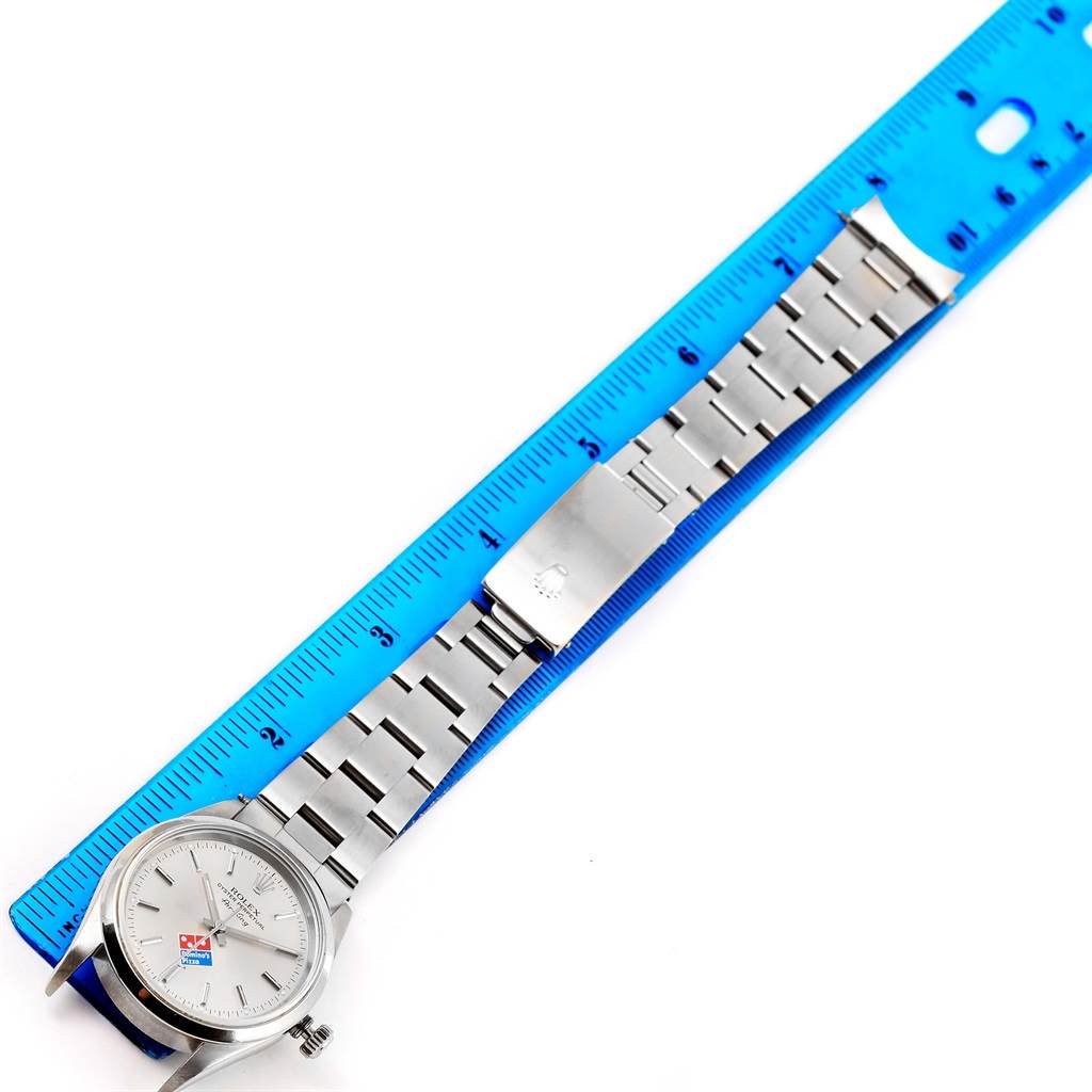 The image shows a Rolex Air-King 14000 Men's Stainless Steel Silver Dial 14000 Men's Stainless Steel Silver Dial watch laid flat next to a ruler, displaying the bracelet and part of the dial.