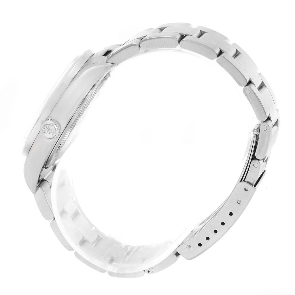 The image shows a Rolex Air-King 14010 Men's Stainless Steel Black Dial 14010 Men's Stainless Steel Black Dial watch from a side view, highlighting the case, bracelet, and clasp.