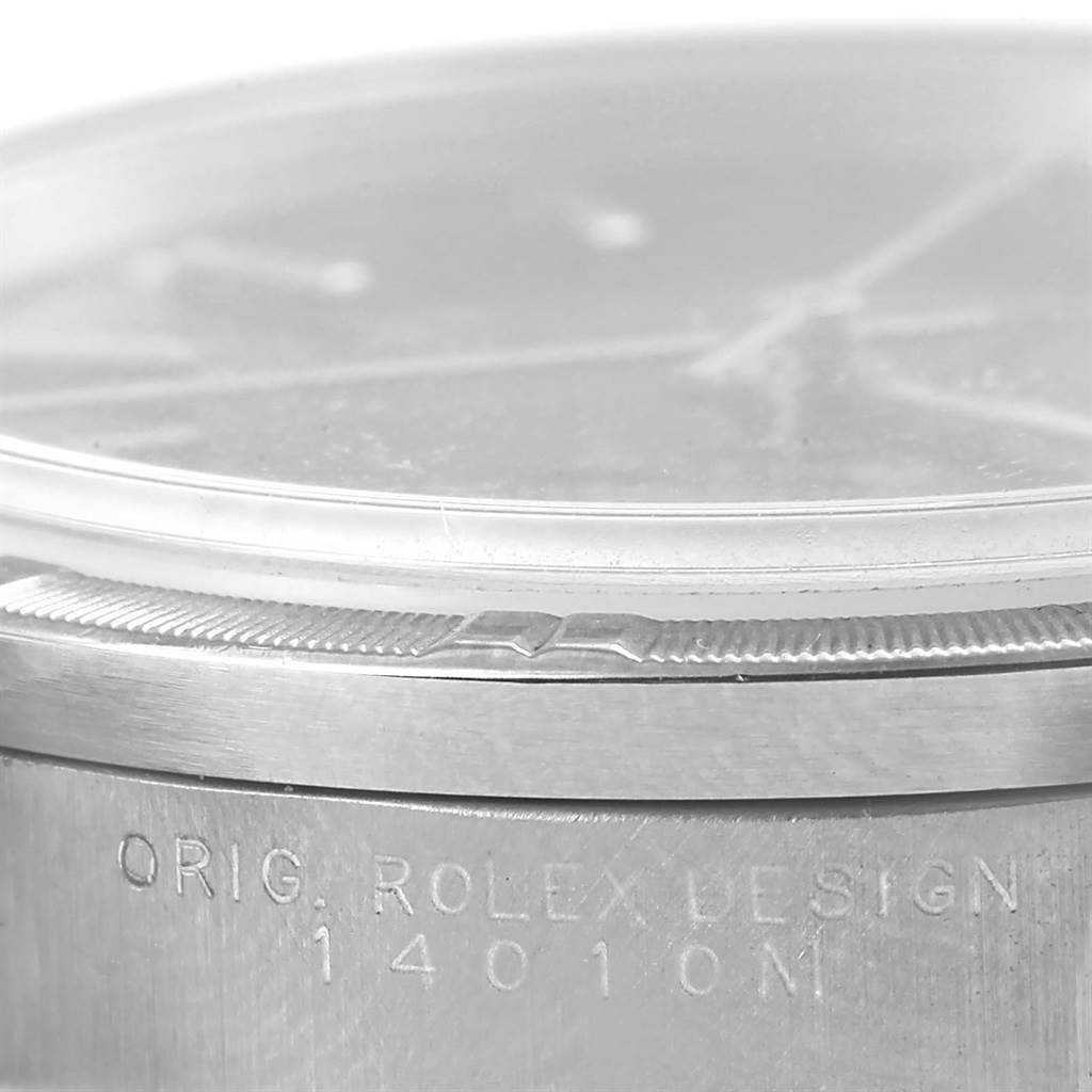 This close-up image shows the case side and the engraved model number of the Rolex Air-King 14010 Men's Stainless Steel Black Dial 14010 Men's Stainless Steel Black Dial watch.