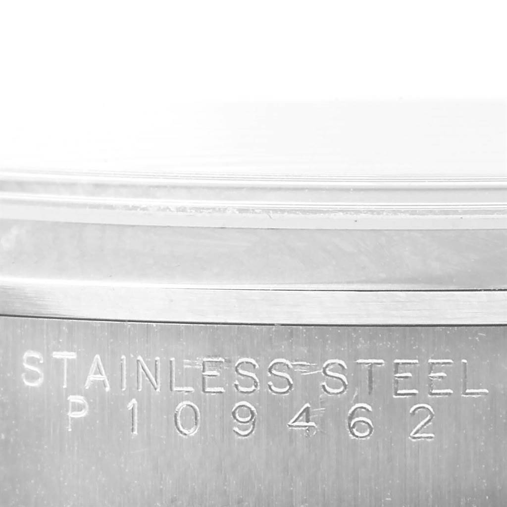 This is a close-up shot of the stainless steel casing showing the serial number of the Rolex Air-King 14000 Men's Stainless Steel Silver Dial 14000 Men's Stainless Steel Silver Dial watch.