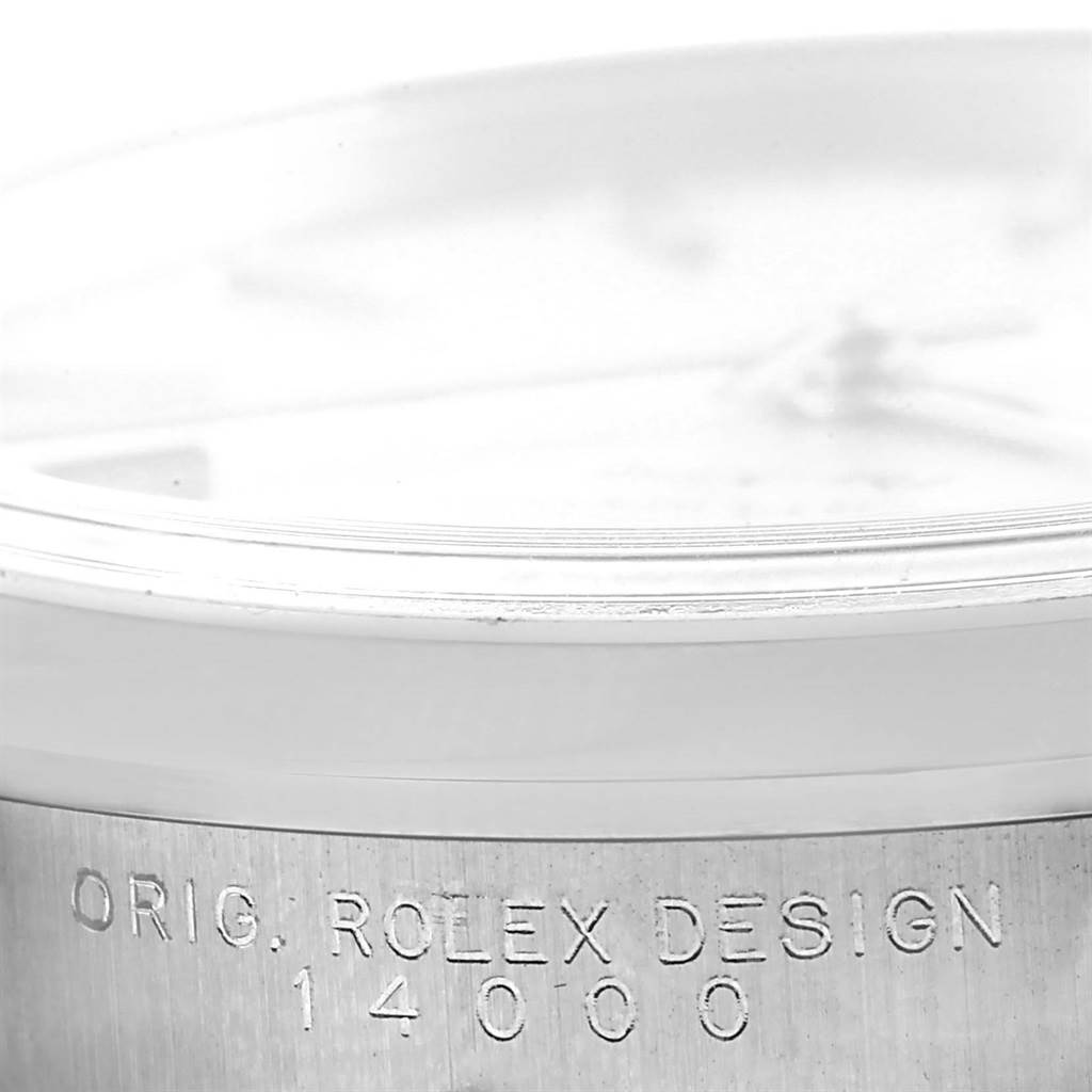 This image displays a close-up side view of the bezel and a portion of the case of a Rolex Air-King 14000 Men's Stainless Steel Silver Dial 14000 Men's Stainless Steel Silver Dial watch with the model number 14000.