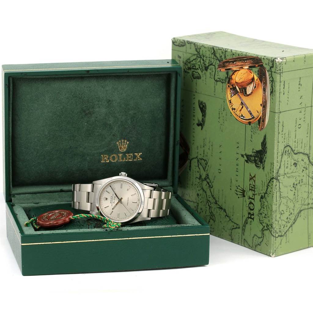 The image shows the Rolex Air-King 14000 Men's Stainless Steel Silver Dial 14000 Men's Stainless Steel Silver Dial watch placed inside an open green Rolex box, with the box cover displayed beside it.