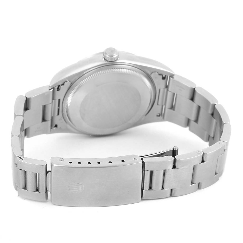 This image shows the back and clasp of the Rolex Air-King 14000 Men's Stainless Steel Silver Dial 14000 Men's Stainless Steel Silver Dial watch, highlighting its stainless steel case and bracelet.