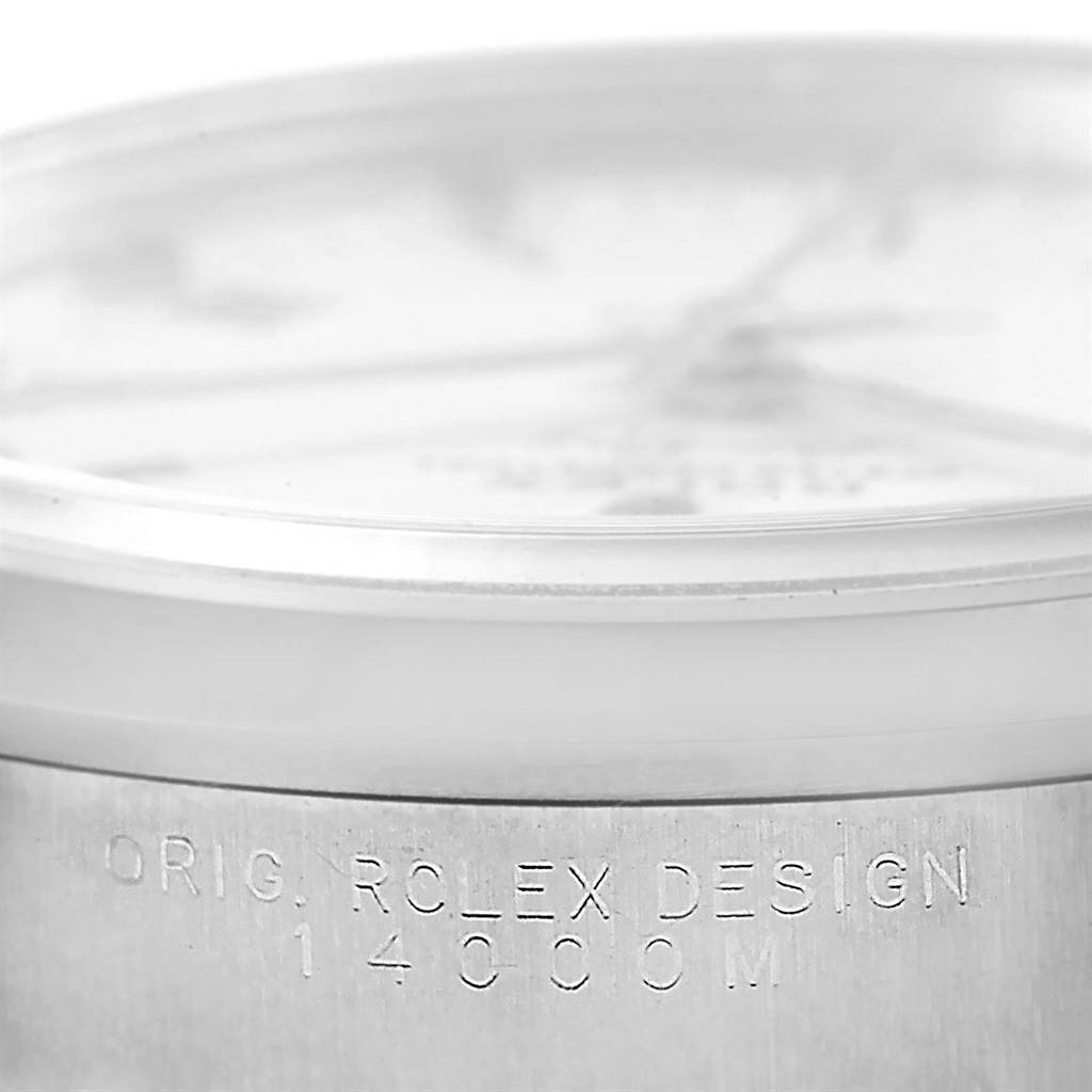 The image shows a close-up of the side of a Rolex Air-King 14000 Men's Stainless Steel White Dial 14000 Men's Stainless Steel White Dial watch, highlighting its engraved model number and design details.