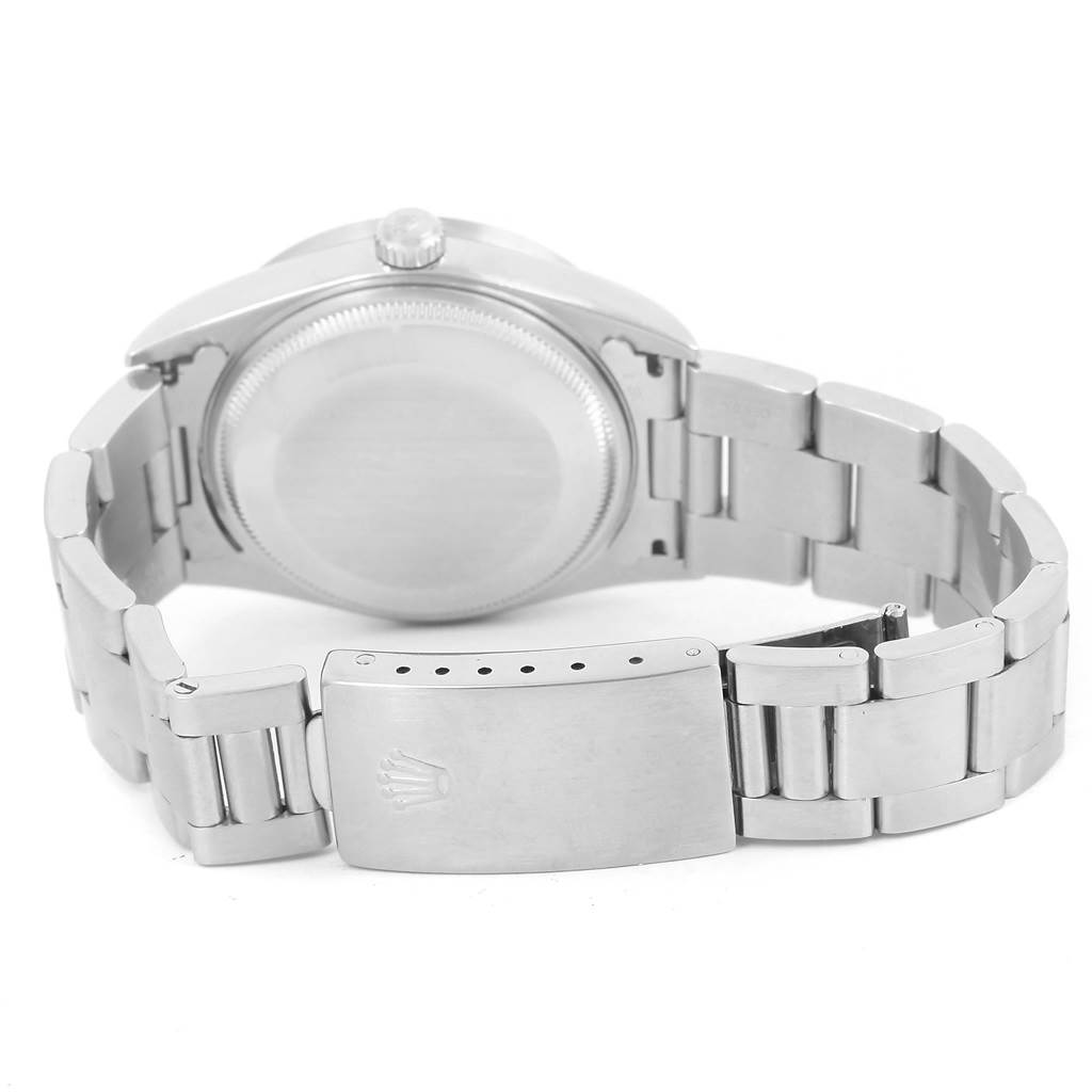 The image shows the back and clasp of a Rolex Air-King 14010 Men's Stainless Steel White Dial 14010 Men's Stainless Steel White Dial watch, highlighting the case back, bracelet, and the clasp with Rolex branding.