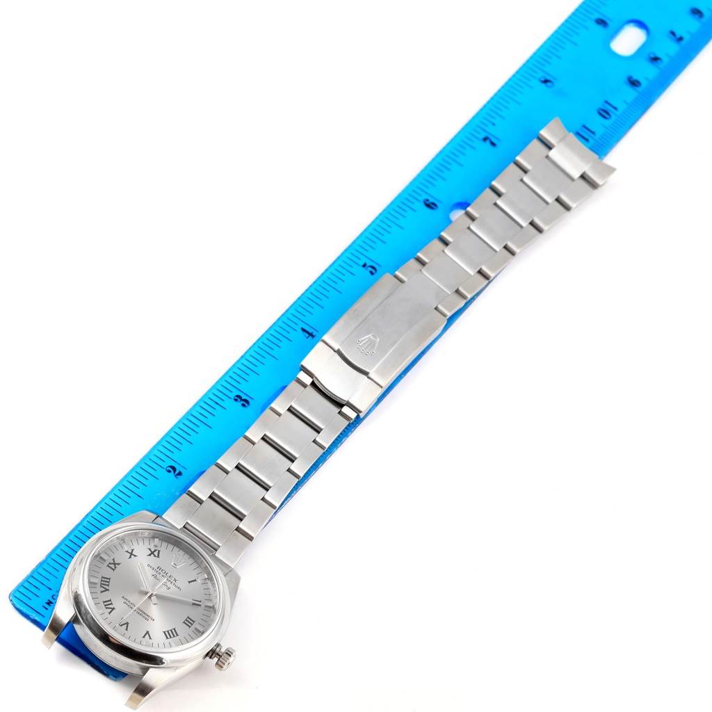 The Rolex Air-King 114200 Men's Stainless Steel Grey Dial 114200 Men's Stainless Steel Grey Dial watch is shown from a top-down angle, including the face, crown, and entire bracelet.