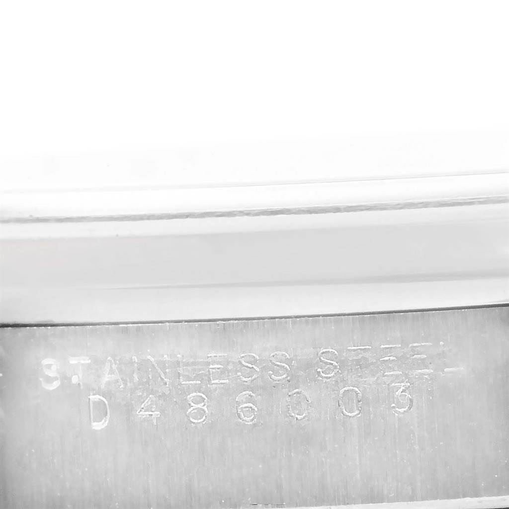 This is a close-up image of the serial number etched on the stainless steel case of a Rolex Air-King 14000 Men's Stainless Steel Blue Dial 14000 Men's Stainless Steel Blue Dial watch.