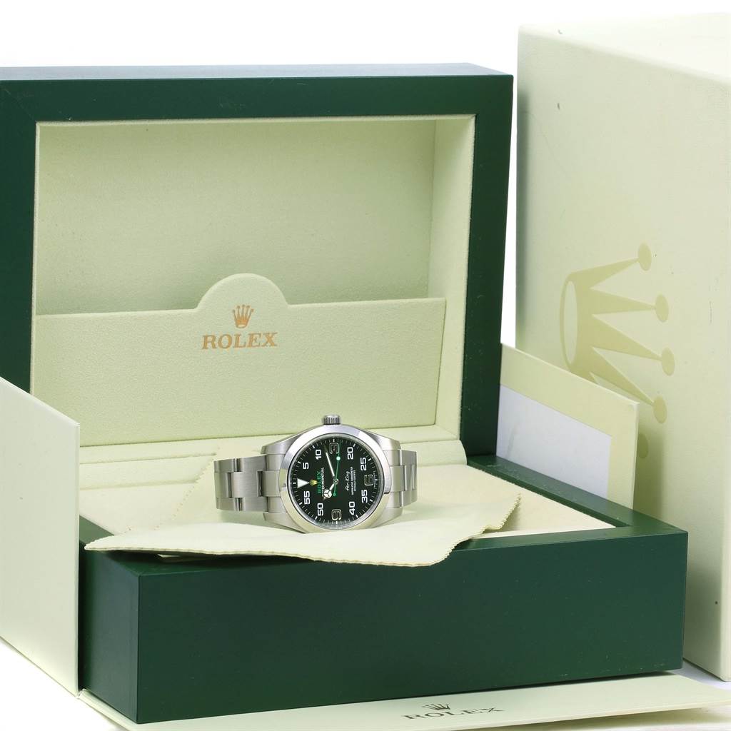 The Rolex Air-King 116900 Men's Stainless Steel Black Dial 116900 Men's Stainless Steel Black Dial watch is displayed front-on in its branded box, showing the dial and bracelet.
