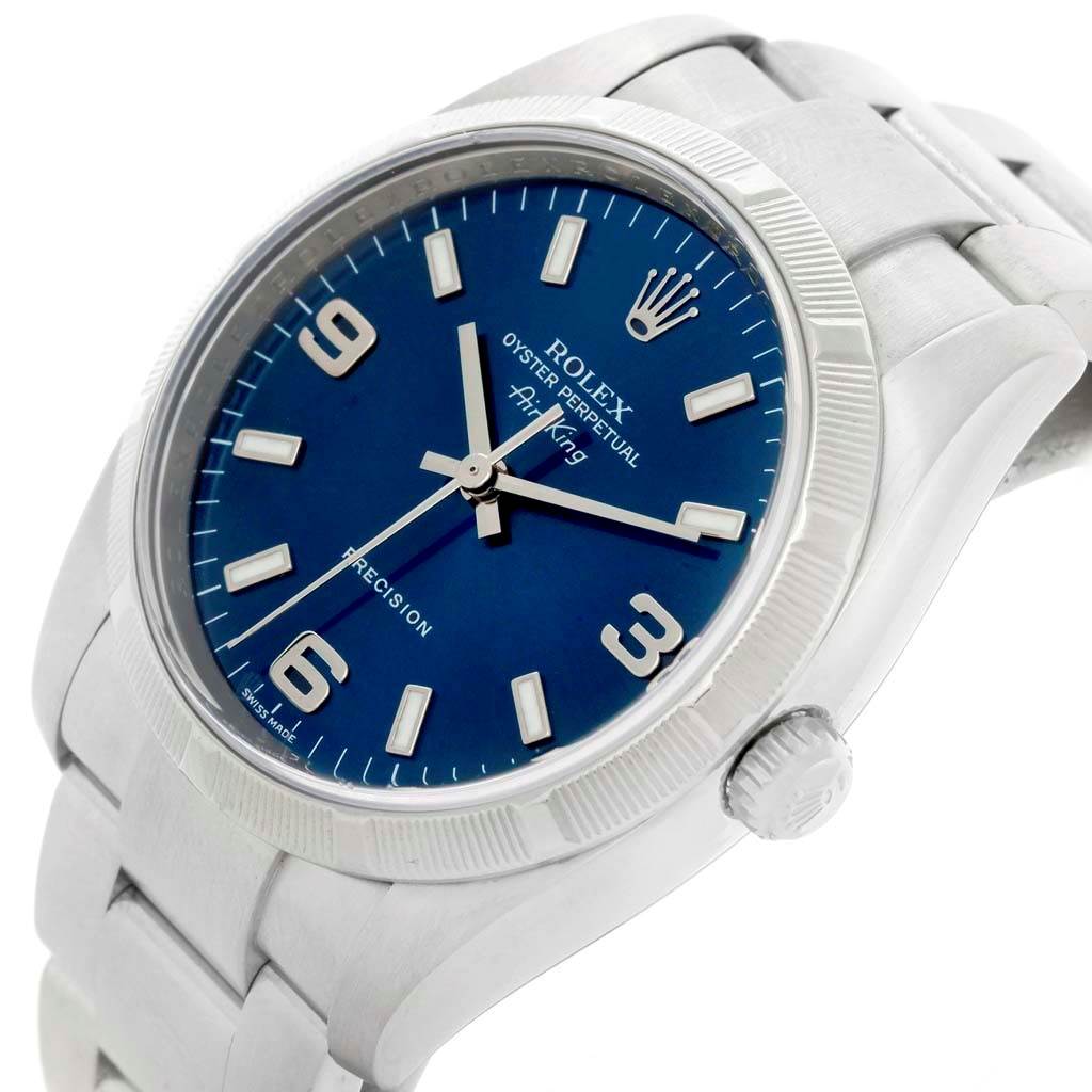 The image shows a Rolex Air-King 114210 Men's Stainless Steel Blue Dial 114210 Men's Stainless Steel Blue Dial watch at a slight angle, focusing on its blue dial, case, crown, and part of the bracelet.