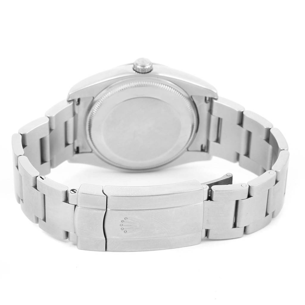 This image shows the back view of the Rolex Air-King 114210 Men's Stainless Steel Blue Dial 114210 Men's Stainless Steel Blue Dial watch, including the closed clasp and bracelet.