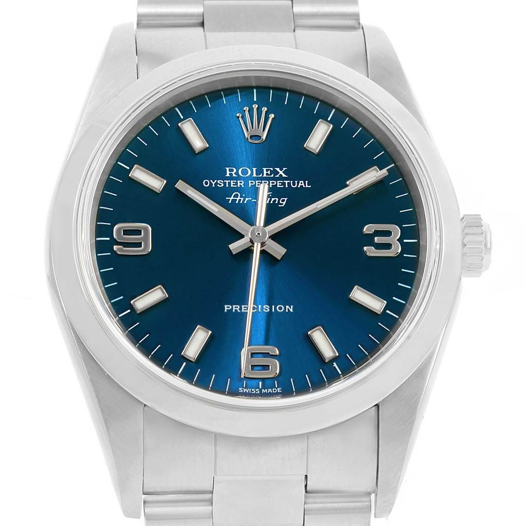 The image shows a front view of a Rolex Air-King 14000 Women's Stainless Steel Blue Dial 14000 Women's Stainless Steel Blue Dial watch, highlighting the dial, hands, bezel, and part of the bracelet.