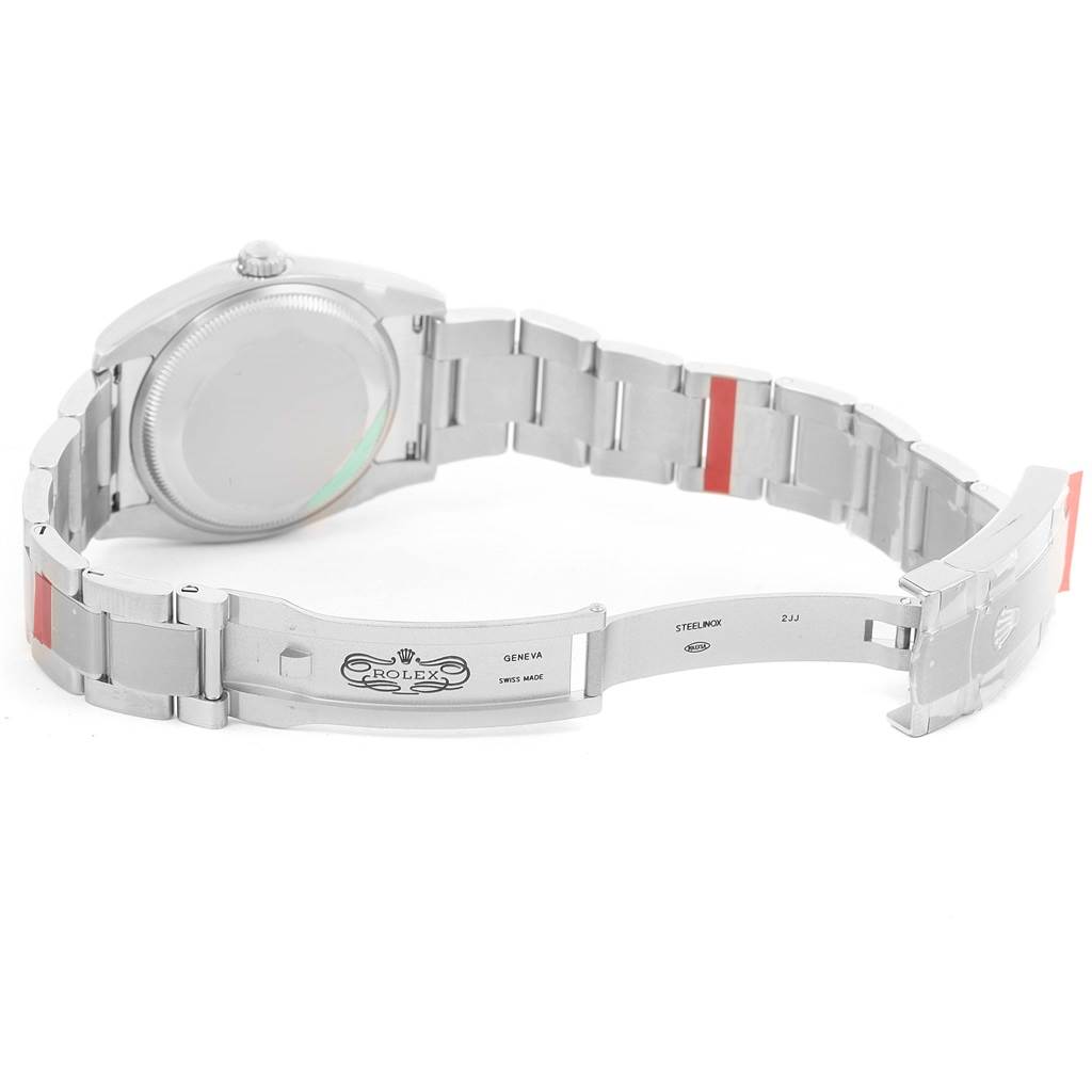 The image shows the back and bracelet of a Rolex Air-King 114200 Men's Stainless Steel Silver Dial 114200 Men's Stainless Steel Silver Dial watch, presenting its deployment clasp open.