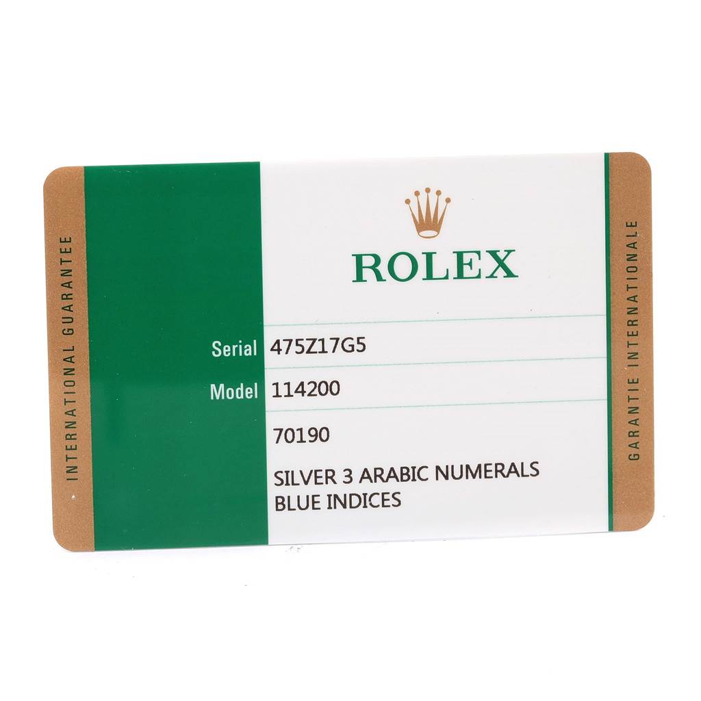 This image shows the warranty card for the Rolex Air-King 114200 Men's Stainless Steel Silver Dial 114200 Men's Stainless Steel Silver Dial model 114200, detailing its serial number and features.