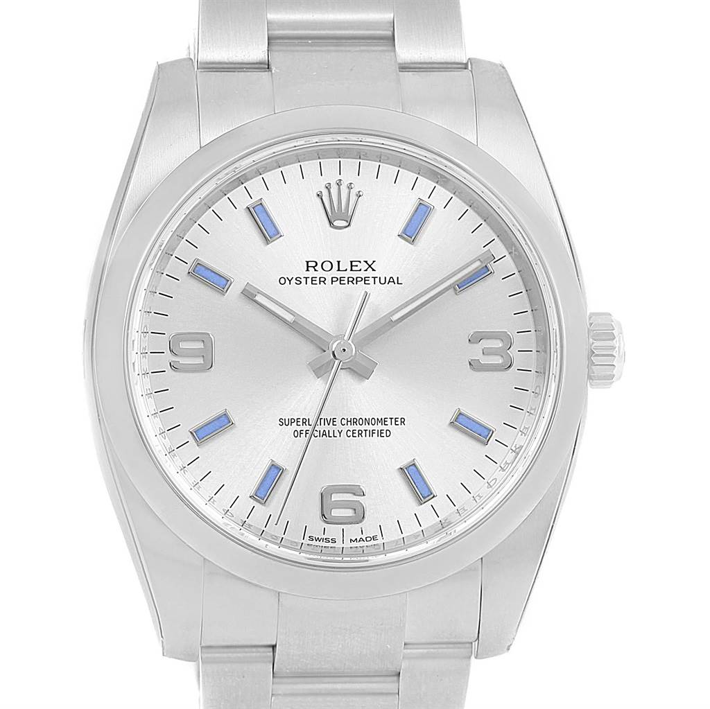 The image shows a front view of a Rolex Air-King 114200 Men's Stainless Steel Silver Dial 114200 Men's Stainless Steel Silver Dial watch, highlighting the dial, hour markers, hands, and part of the bracelet.
