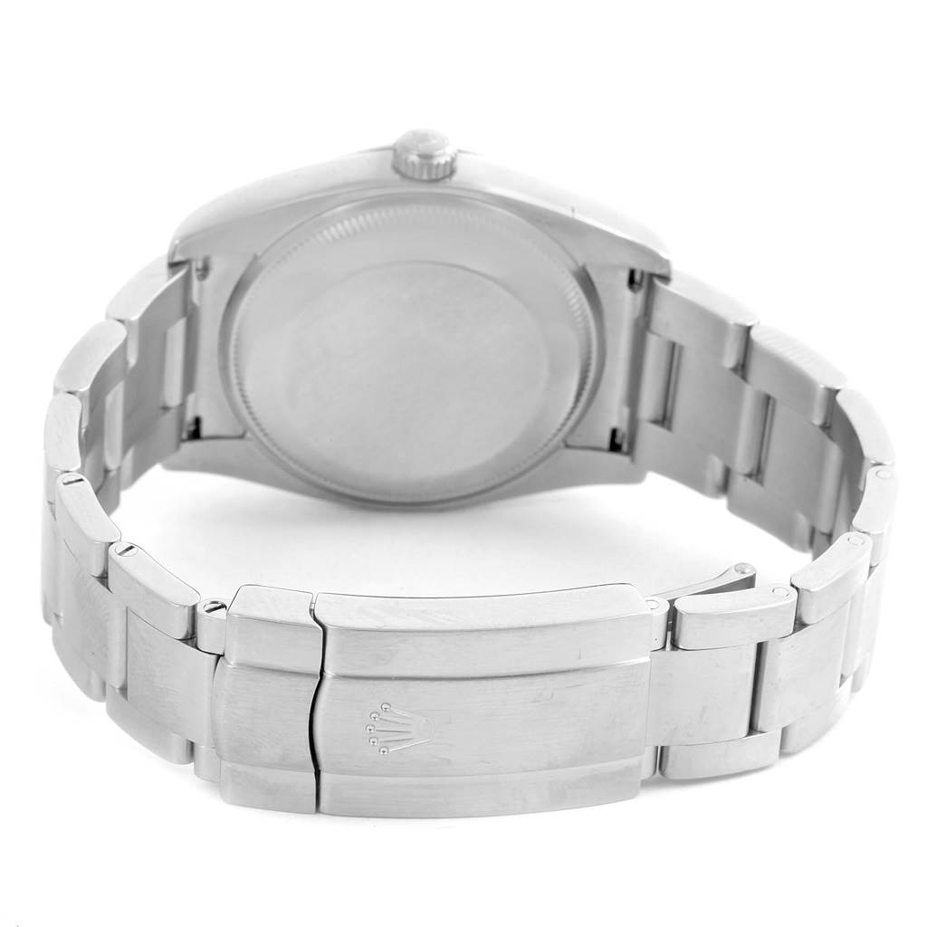 The image shows the back of a Rolex Air-King 114200 Men's Stainless Steel Silver Dial 114200 Men's Stainless Steel Silver Dial watch, focusing on the case back and part of the bracelet.